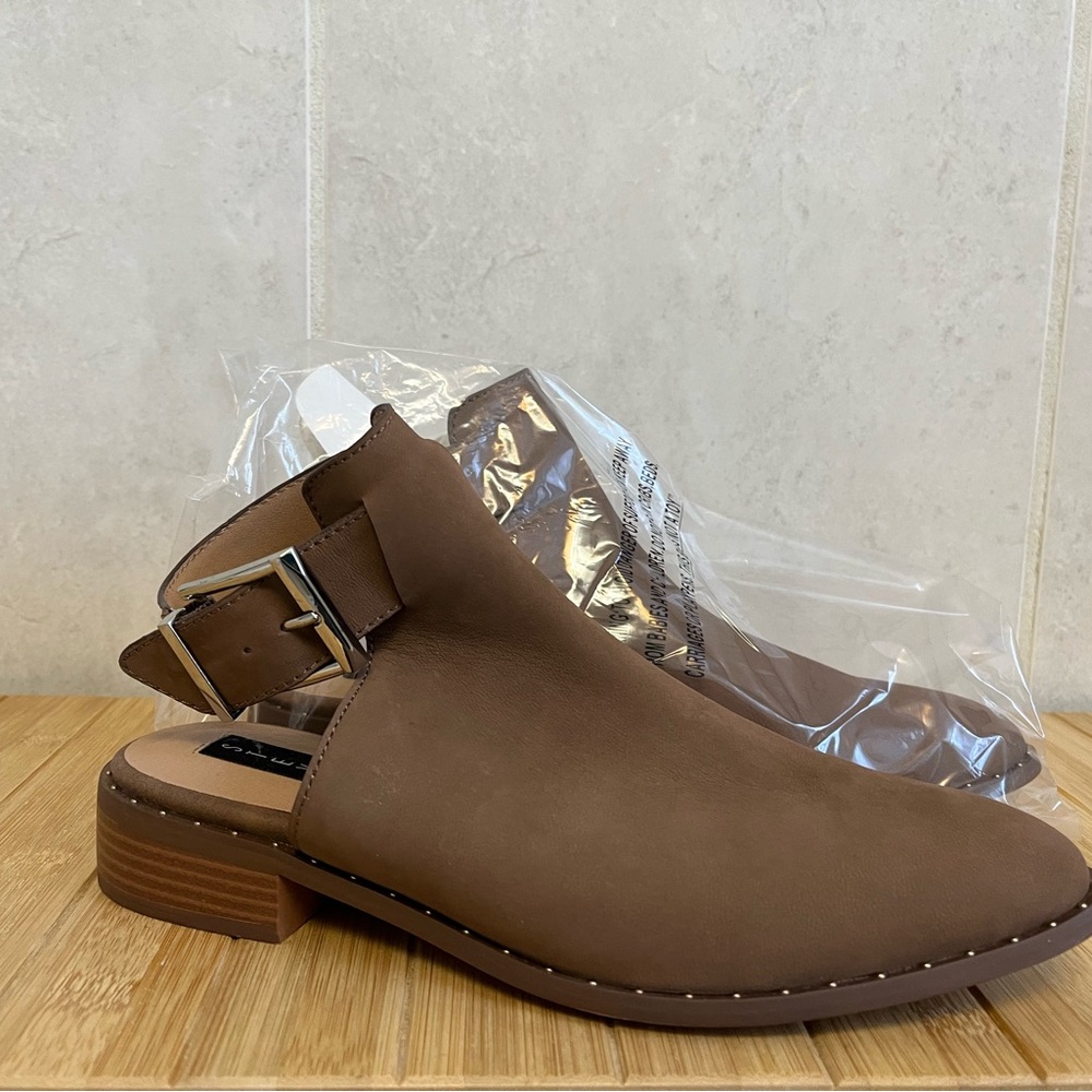 Tan nubuck flat sandal with silver buckle